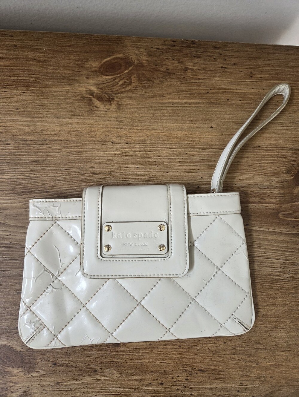 Kate Spade Ivory Patent Leather Wristlet